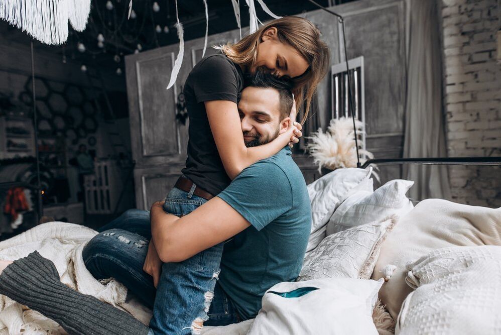 Woman hugs man, which increases potency